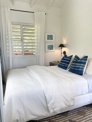 Bedroom #1. Queen sized bed, nightstands, dresser, closet, smart tv. 