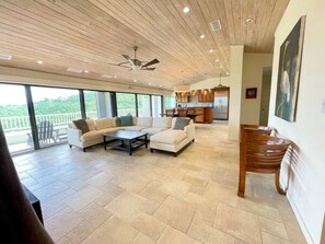 Open floor plan kitchen, dining & living area