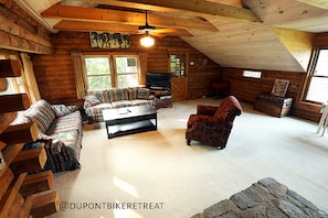 Livingroom with authentic log cabin interior