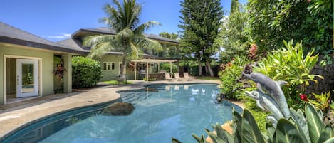 Dolphin House features a 850 sqft private heated swimming pool in a gated yard