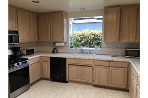 Lots of Kitchen space, gas stove and range, dishwasher, toaster oven