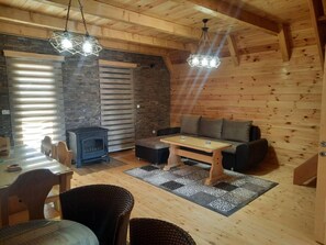 Cozy living room with sofa bed, TV, Wi-Fi, wood stove..