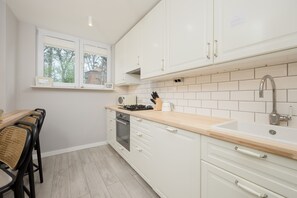 The kitchen's functional layout is perfect for family meals. 