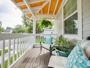 Elegant front porch to sip your morning coffee or enjoy some rest and relaxation.