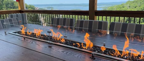 Enjoy dinner and a fire outside on the main level deck.