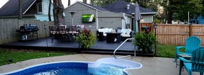 Enjoy game day or movie night on the 55"  TV  on large deck by the fire pit.