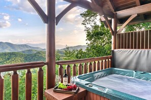 Soak in the hot tub and enjoy beautiful views of the Smokies.