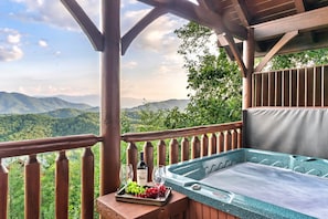 Soak in the hot tub and enjoy beautiful views of the Smokies.