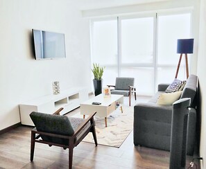 Living room with a 55" UHD Smart TV