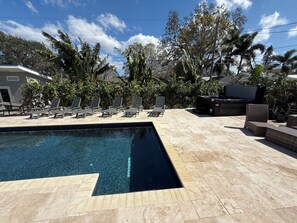 Hot Tub next to the pool so you can jump in and cool down.