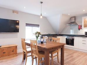 Kitchen/dining area with lovely dining table and chairs | Bank Apartment 2, Dartmouth