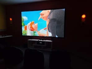 Huge screen and projector with high quality sounds system!