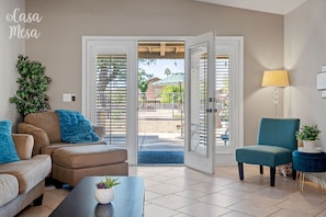 The Family Room has French Doors that lead to the back patio. 