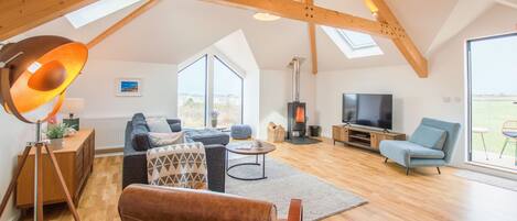 Birch House, St Agnes. First floor:  Spend cosy evenings in front of the wood burning stove