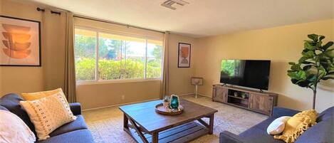 Spacious living room with the canyon view for the whole fam to relax and unwind