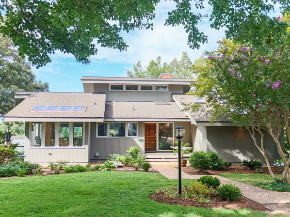 Stunning waterfront home offers amazing Creek views beach dock kayaks & sleeps 8