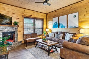 family room with fireplace & smart tv