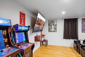 Game on at KushKations Chronic 🕹️: Dive into arcade adventures with a backdrop of cinematic luxury 🎬. Entertainment awaits around every corner! 🎮