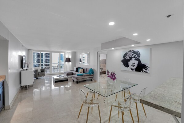 Dining area with seating for 6, living room, Roku tv, balcony access