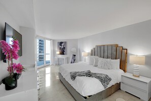 2nd master bedroom suite, king bed, Roku tv, desk, balcony access, bathroom