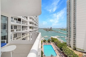 Furnished balcony with views of Biscayne Bay and Sea Isles Marina