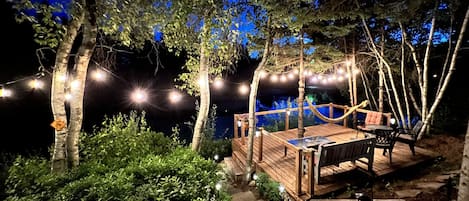Lower deck on edge of pond at night, enjoy the magical sounds of nature