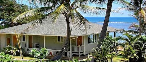 Hawaiian style beach house with vaulted ceilings and a huge Lanai on the beach!