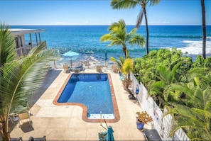 Watch the waves crash from your wrap-around lanai and walkway.