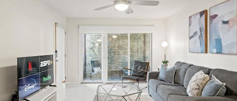 Living room with sleeper sofa and smart TV