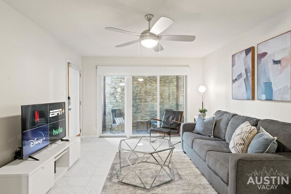 Living room with sleeper sofa and smart TV