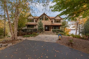 stunning home front view with paved drive