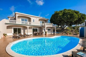Pool terrace and villa