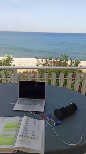 Studying on the balcony