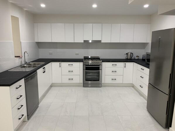 Kitchen - beachside & jetty view Apartment 2- Skippers