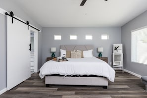 Primary Bedroom with a King Bed, Smart TV, and en-suite bathroom