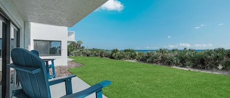 New Smyrna Beach is just steps away from this ground floor condo