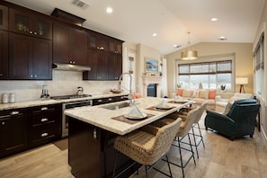 Open floor plan for entertaining. Ocean, city and bay views