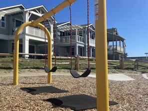 2024 newly remodeled Calabrese Park swings across from house!