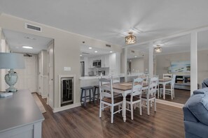 Dining area with seating for six and a recessed beverage fridge