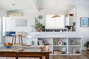 Open plan kitchen and dining with sea view