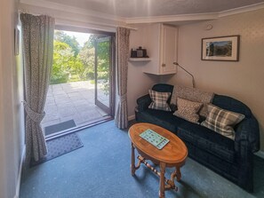 Additional ground floor seating area with French doors to garden | Harwood Dale Cottage, Kendal