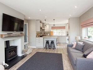 Stylish open plan living/dining room/kitchen with wood burner | Rockmount 1, Salcombe