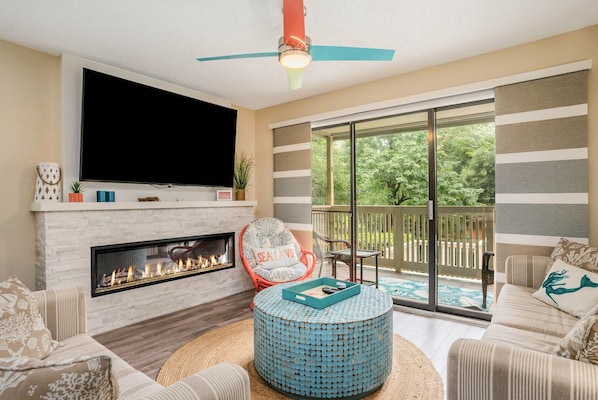 Living room - Living room with amazing faux fireplace!