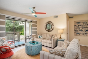 Living room - Living room also features a pullout sofa and access to the oversized, two-tiered back deck!