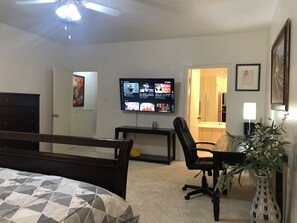 Primary Master Suite:
* King Size Bed
* Queen Mattress
* TV, Desk, & Hot Tub