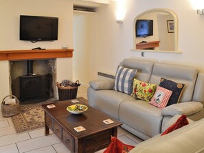 Cosy well presented living room with wood burner | Railston Cottage, Seahouses