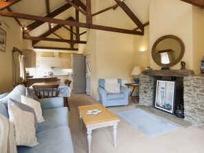 Open plan living space with vaulted and beamed ceilings | Hanger Mill Barn, Salcombe