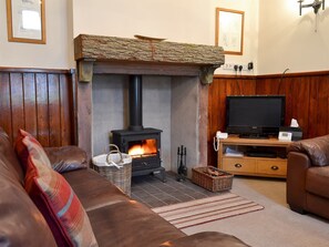 Traditional and warm living and dining room with wood burner | Lealholme, Bassenthwaite, near Keswick