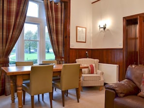 Traditional and warm living and dining room with wood burner | Lealholme, Bassenthwaite, near Keswick