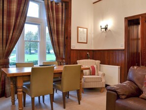 Traditional and warm living and dining room with wood burner | Lealholme, Bassenthwaite, near Keswick